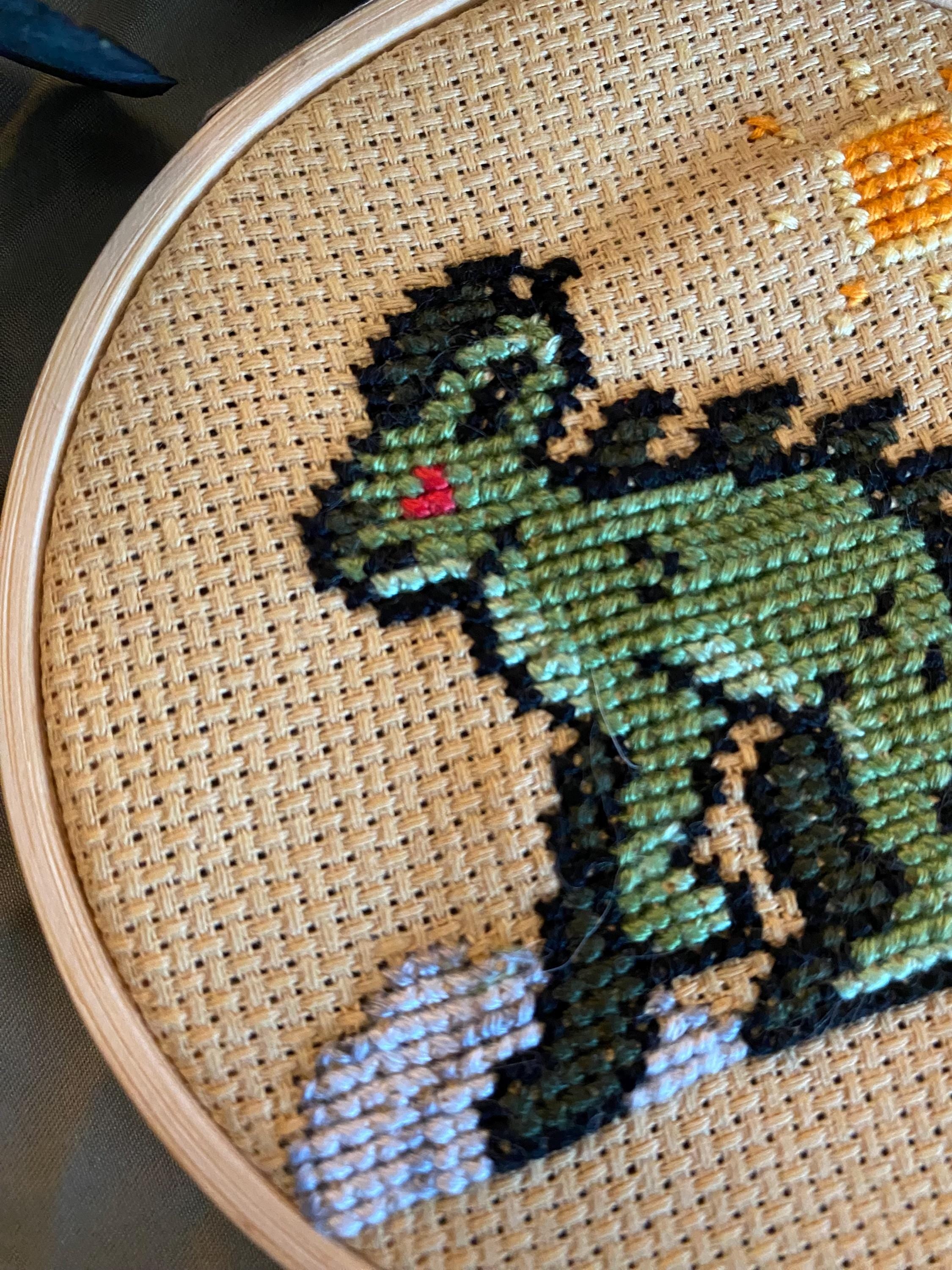 Modèle de point de croix chupacabra pixel art