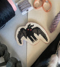 Modèle point de croix mothman