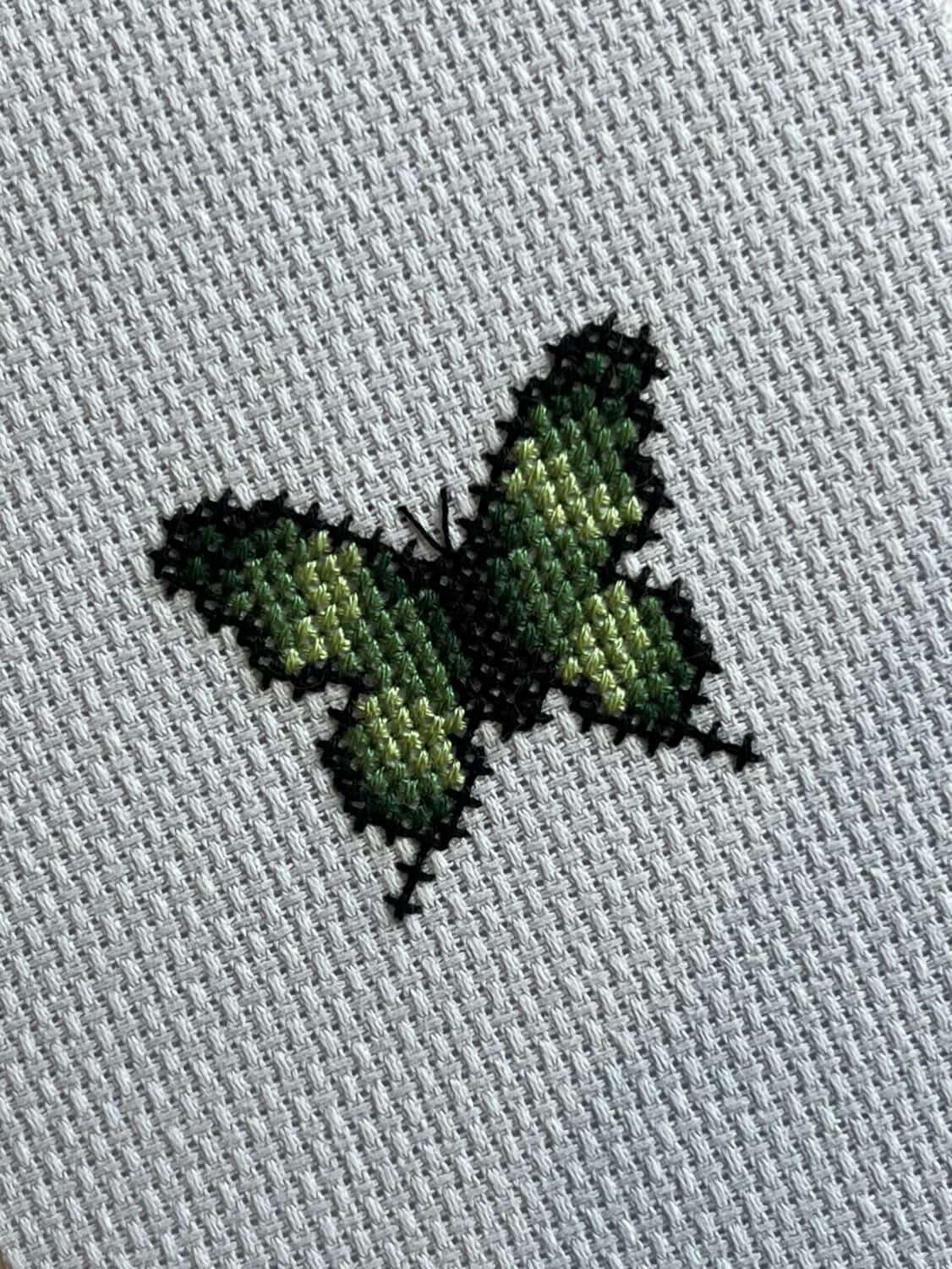 Modèle de point de croix papillons pixel art