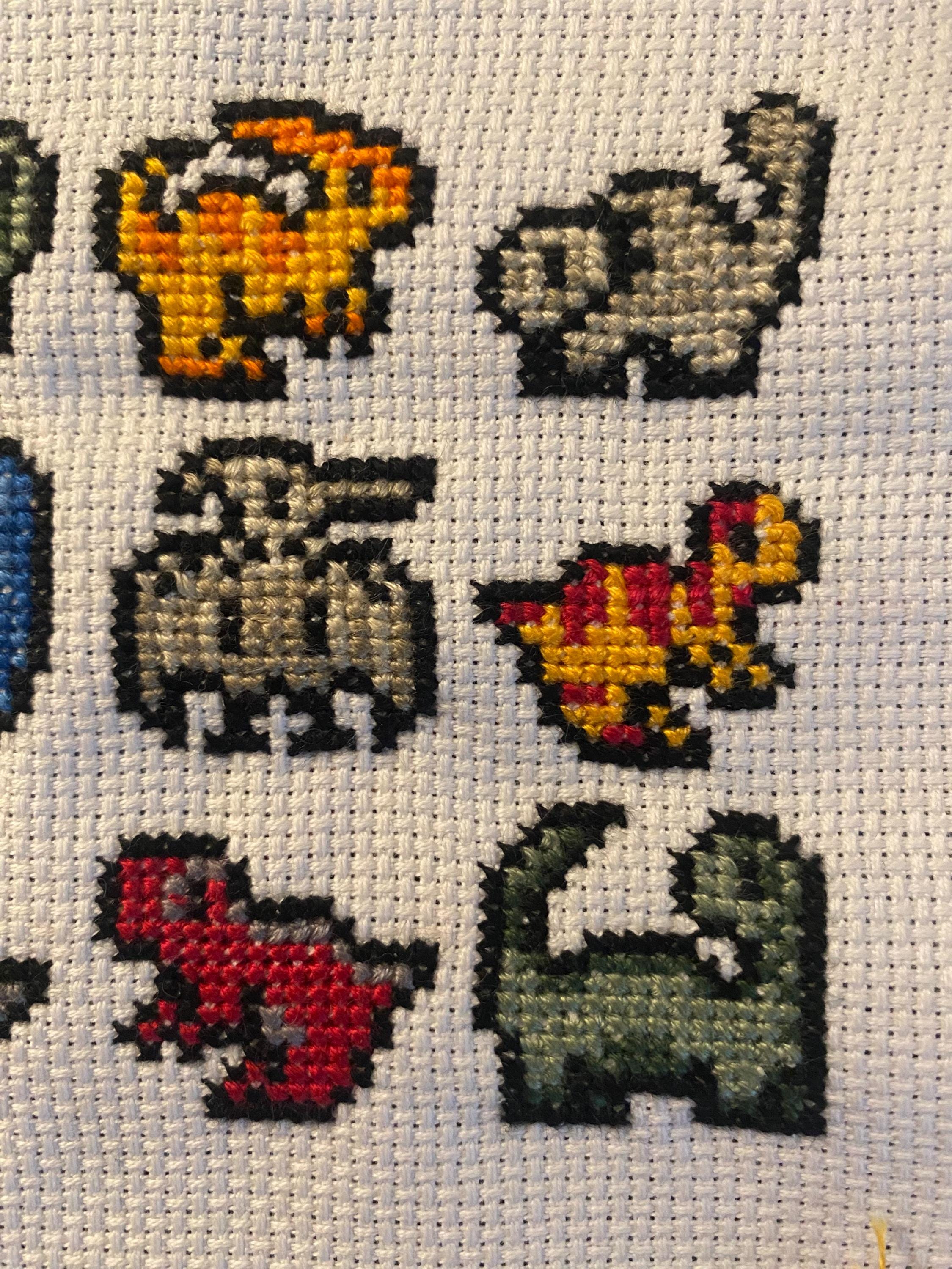 Modèle de point de croix petits dinosaures