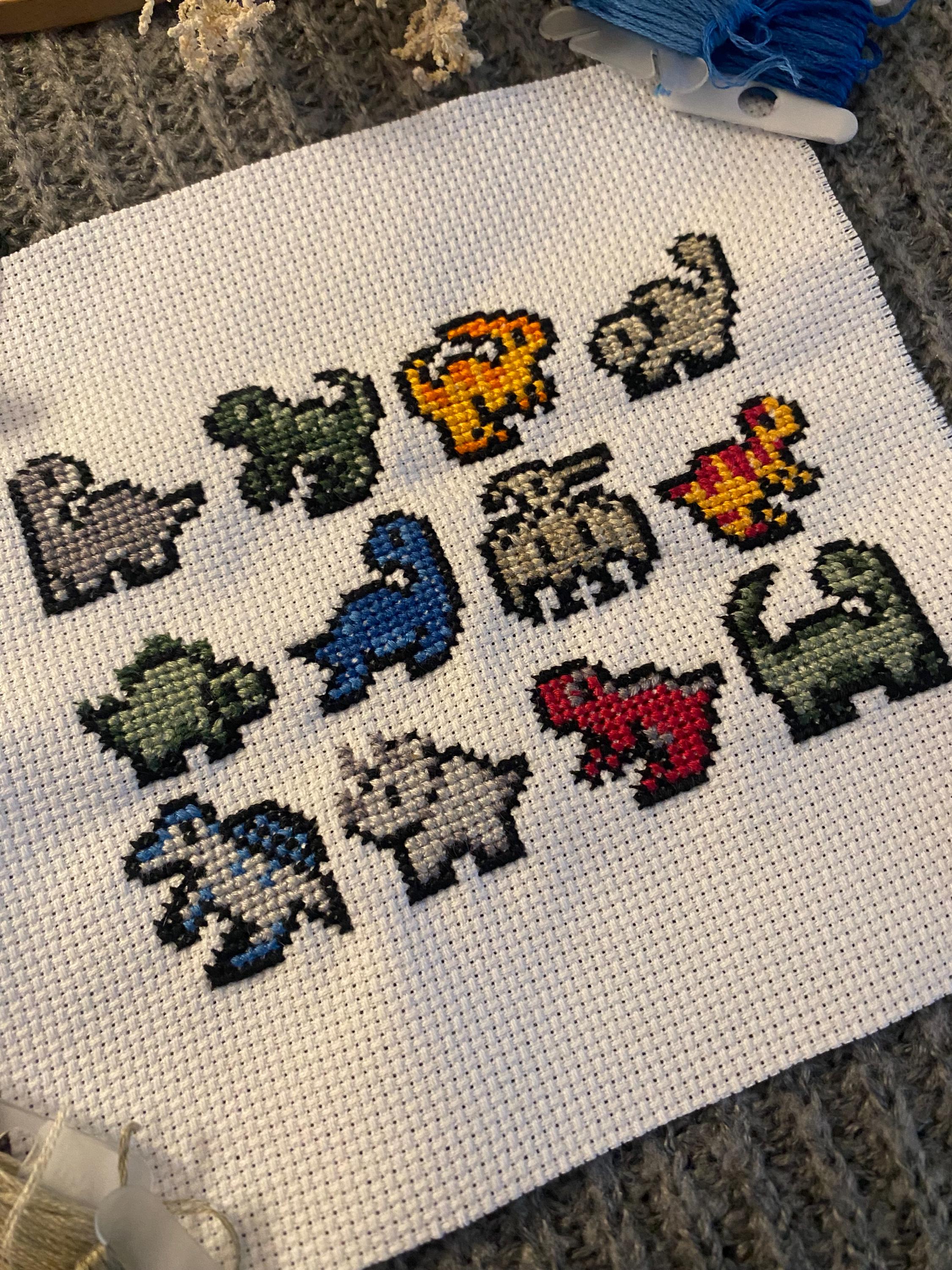 Modèle de point de croix petits dinosaures