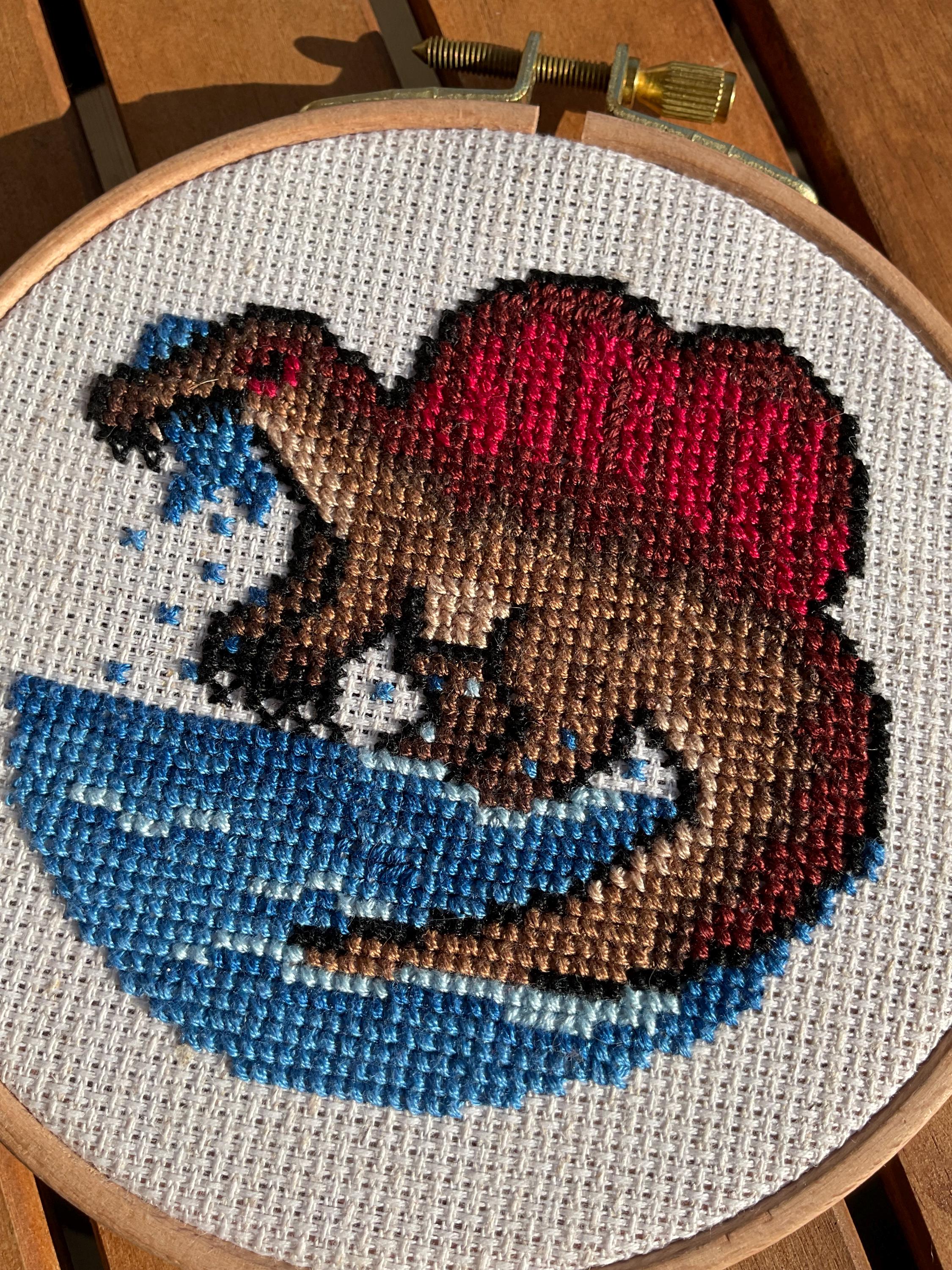 Modèle point de croix spinosaure pixel art
