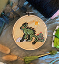 Modèle de point de croix chupacabra pixel art